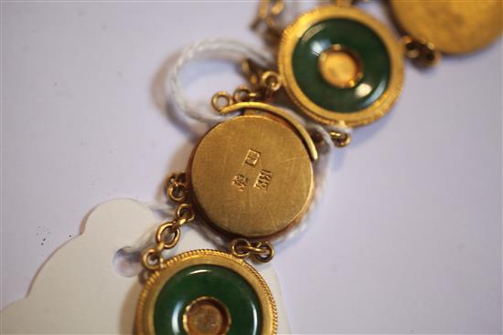 A Chinese high carat gold and jadeite suite of jewellery, comprising a necklace, bracelet and pair of drop earrings,